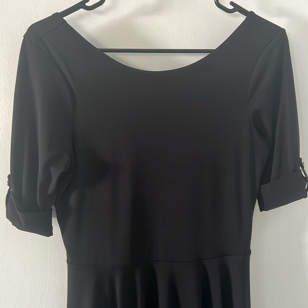 Express black dress Size 6. Scoop back and gold button on rolled sleeves.